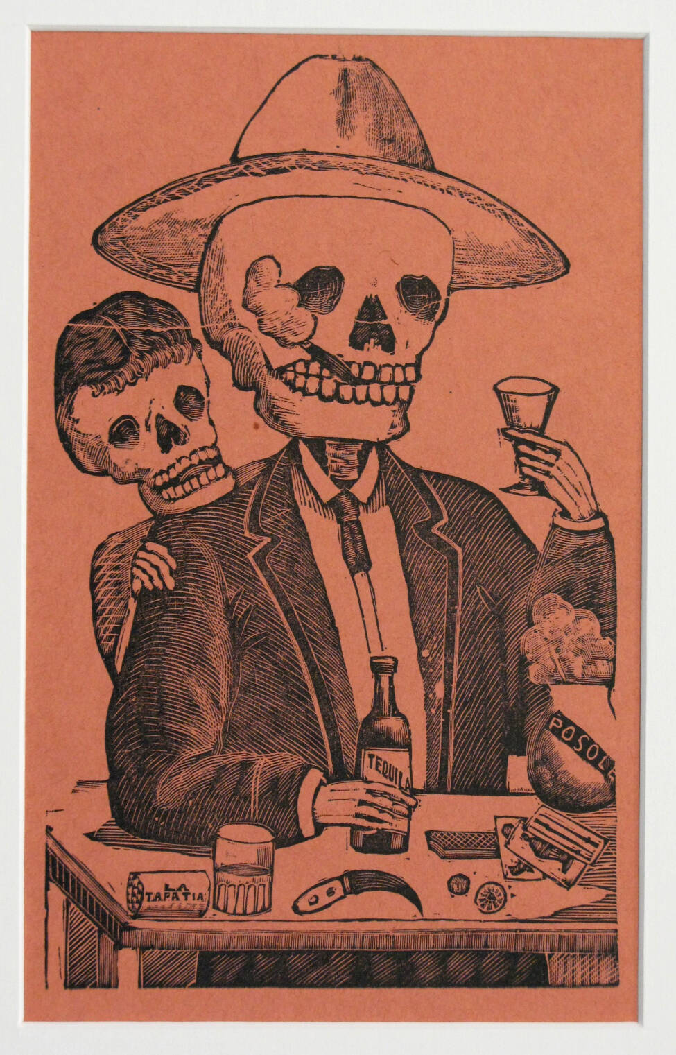 The image is in black and white without borders. It features a skeleton wearing a suit and hat, smoking a cigar and drinking tequila.